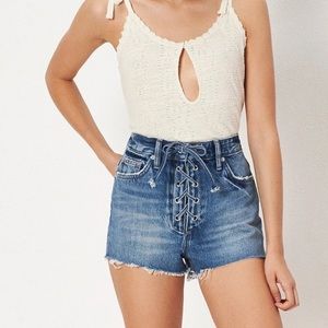 Tularosa high rise tie up denim shorts
